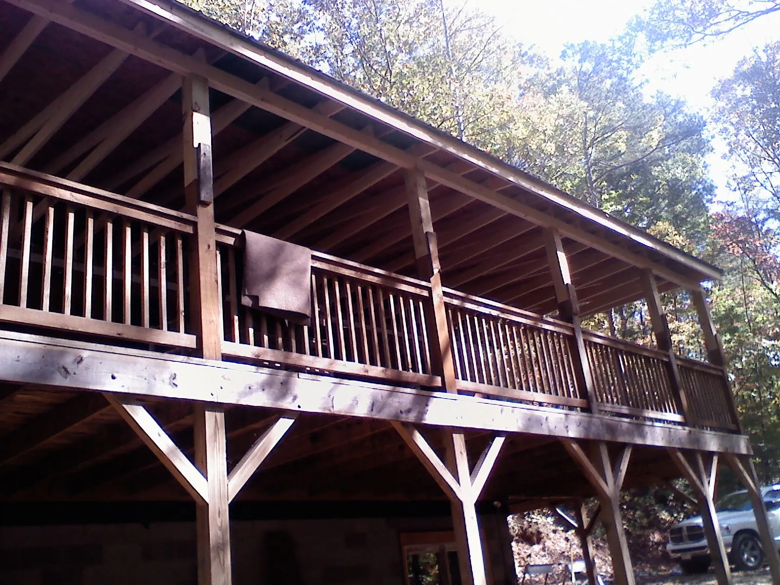 Timber framing under a new elevated porch and deck — Roof Leak Repair in Orange by Roofing Brothers